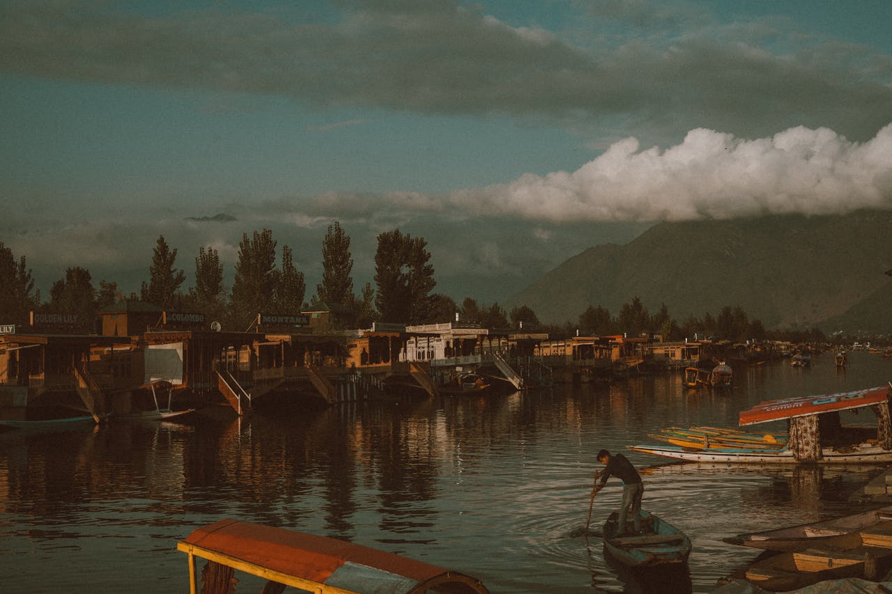 Enchanting houseboats and reflections in Kashmir, India during twilight.